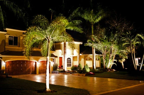 Landscape lighting, highlighting a beautiful estate in Boca Raton, FL